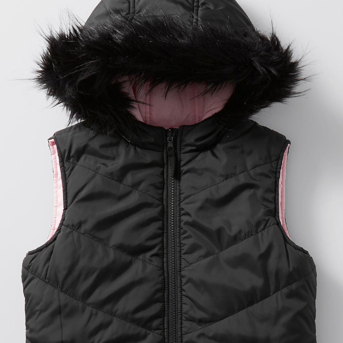 white puffer vest with fur hood