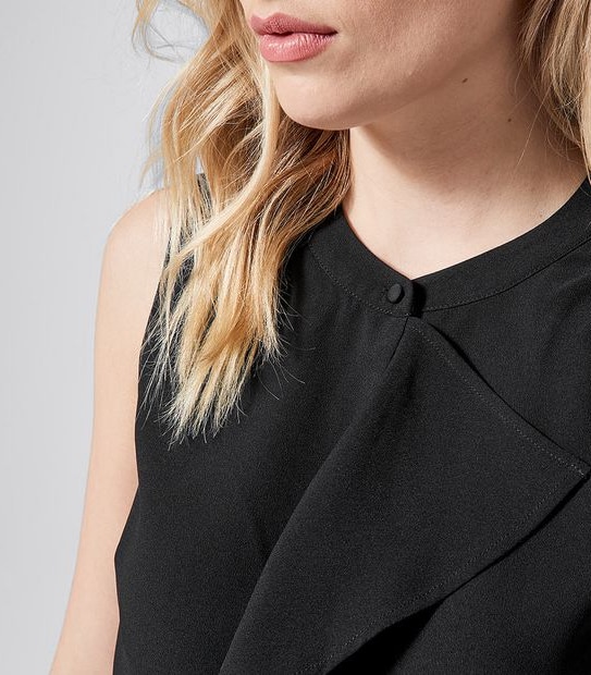 Preview Sleeveless Ruffle Front Shell Top - Black