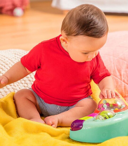 B. baby Whirly Pop Activity Suction Toy