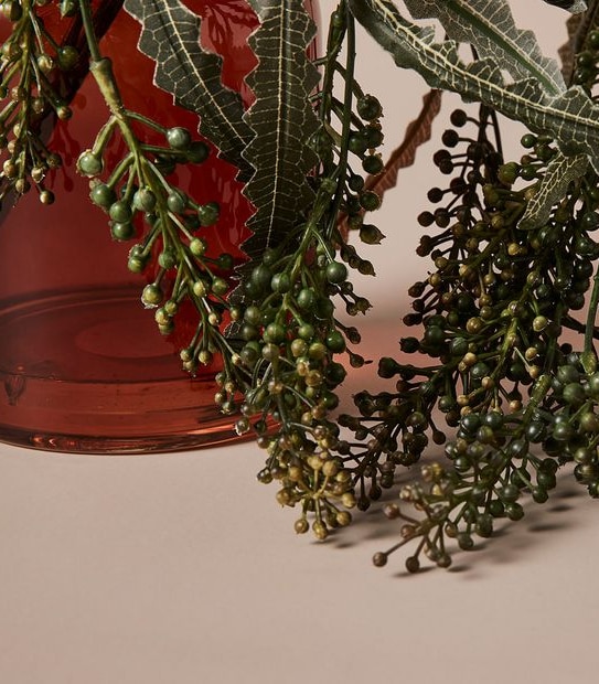 Faux Greenery in Amber Vase